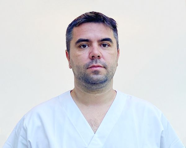 Dr. Adrian Necula